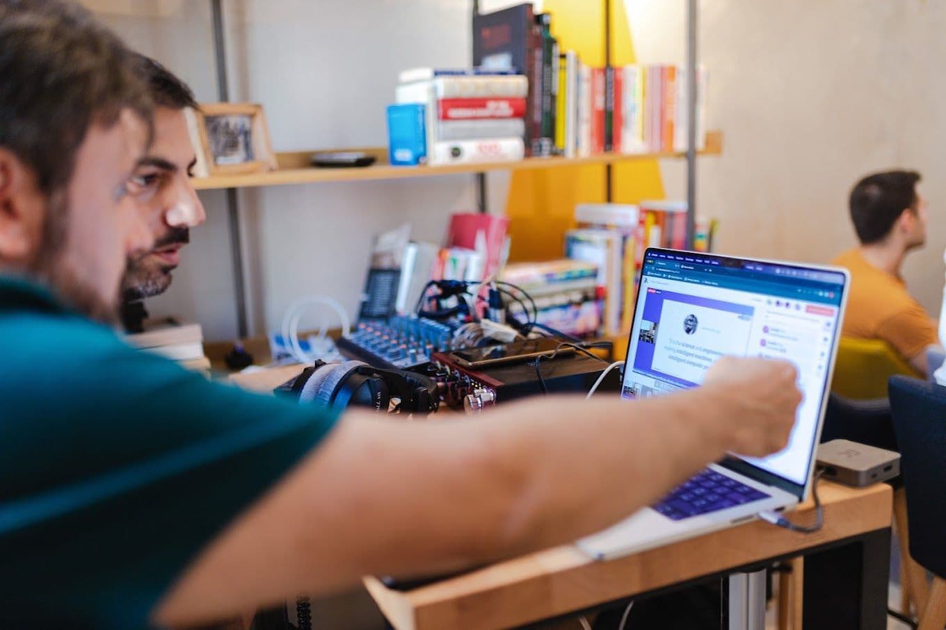 Man pointing at screen