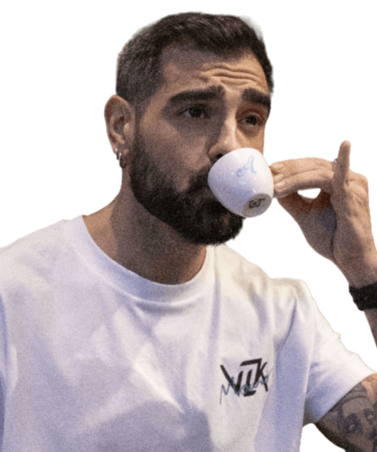 Mauro drinking a coffee